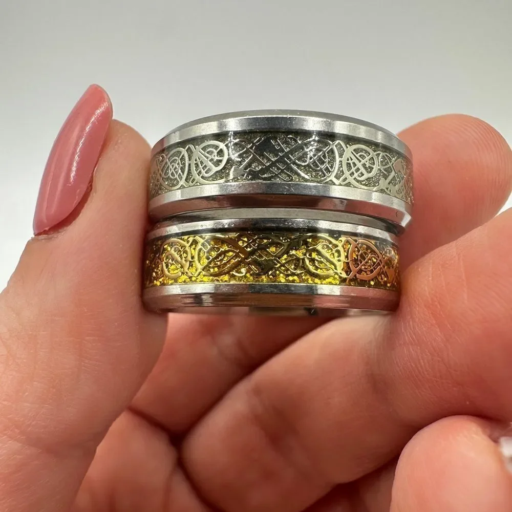 Men's size 13, Silver tone‎ metal with silver/gold scroll work in center, ring!